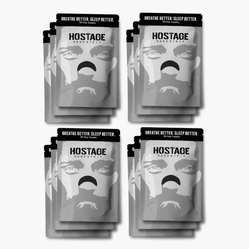 hostage tape 12 month bundle of nose strips with the title of trusted by 100,000+ people and UFC showing extra strength improves nasal congestion and promotes nasal breathing for life changing sleep 